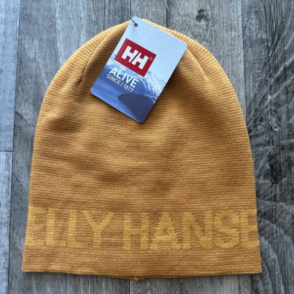 Helly Hansen TRAVERSE BEANIE 434 Golden Glow Ski Winter Unisex Adults Head Gear - Picture 1 of 6